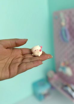 دکوری خوک بازیگوش نشسته صورتی