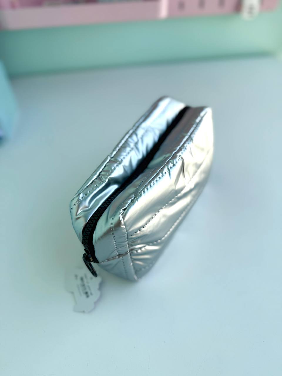 کیف لوازم آرایش مستطیلی نقره ای