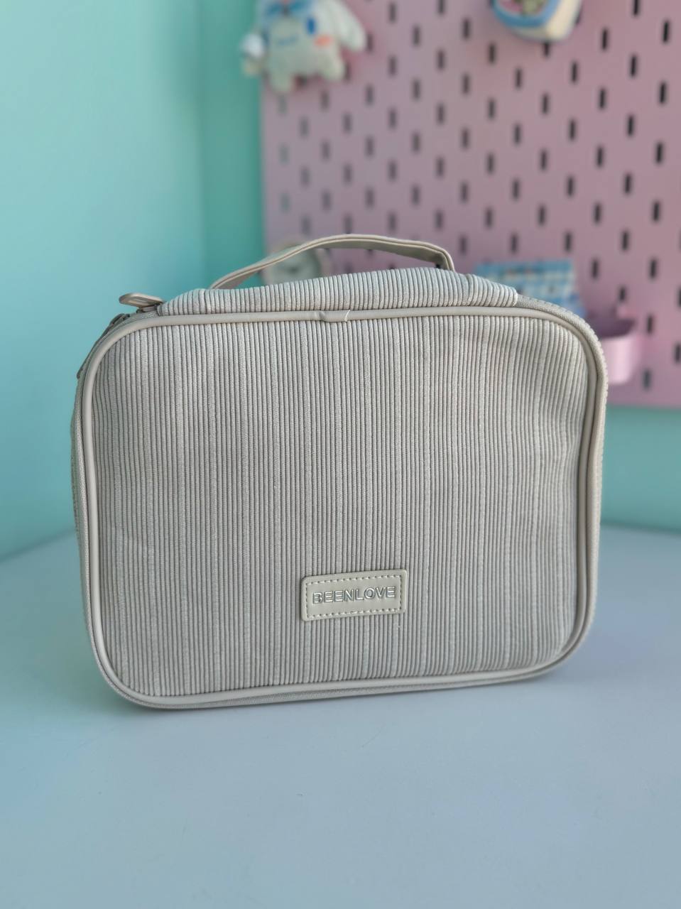 کیف لوازم آرایش راه راه پاستلی