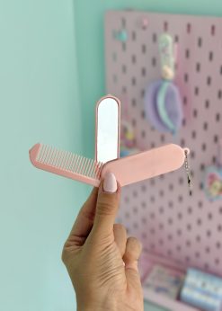 شانه جیبی هلوکیتی صورتی