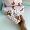 کیف آرایشی پینترستی تدی چهارخونه صورتی